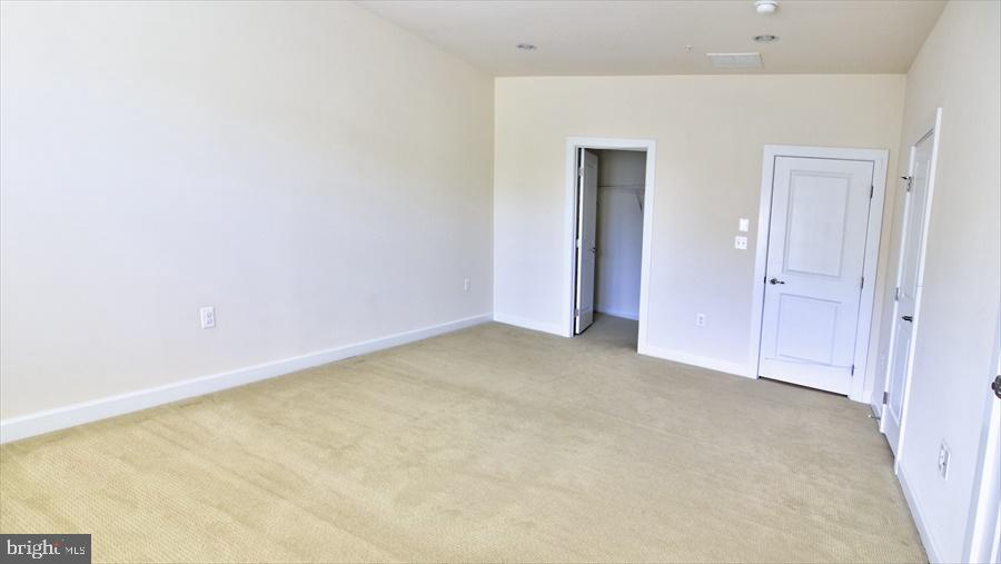 7652 Telamon Way Hanover, MD 21076 - Photo 23 of 34 a view of an empty room