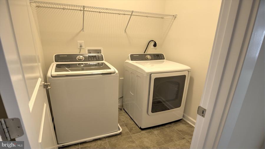 7652 Telamon Way Hanover, MD 21076 - Photo 29 of 34 a utility room with dryer and washer