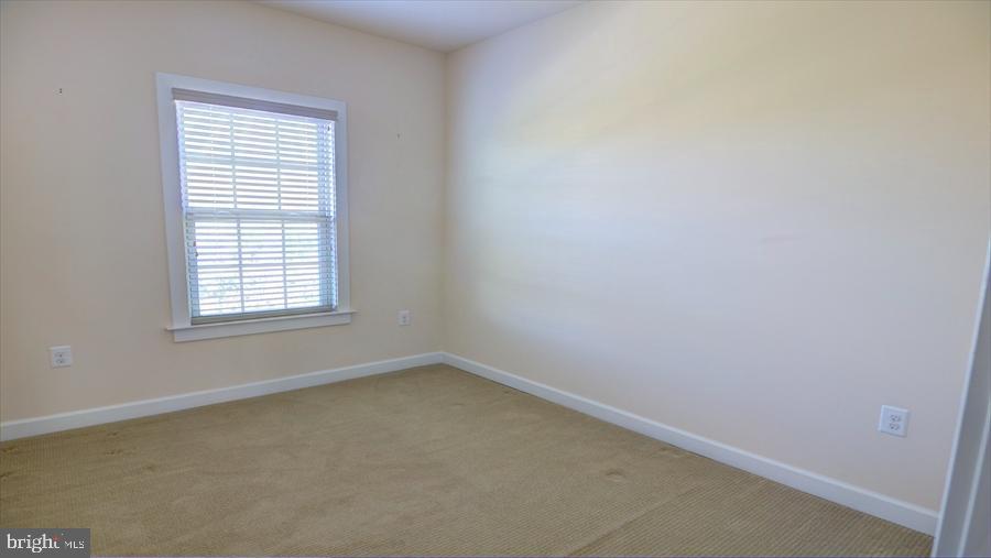 7652 Telamon Way Hanover, MD 21076 - Photo 31 of 34 an empty room with a window