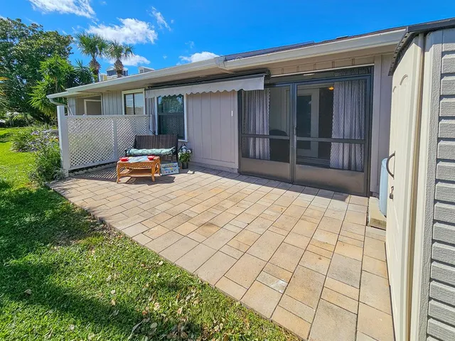 a house view with a outdoor space