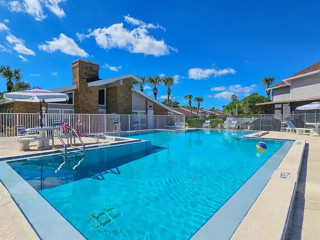 a view of a house with a swimming pool