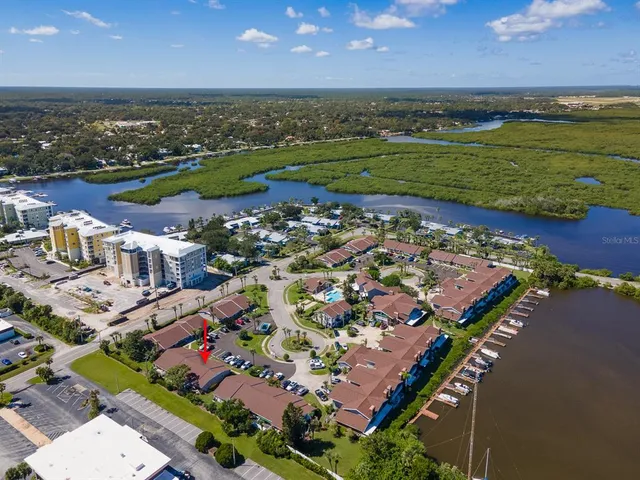 an aerial view of a house with a garden