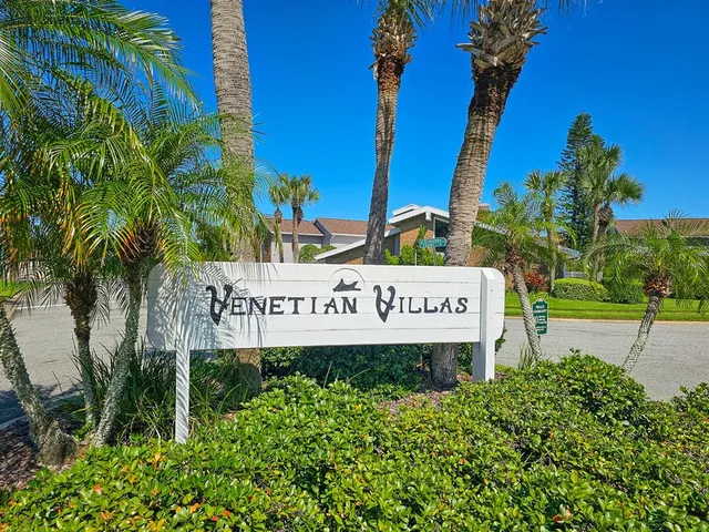 a sign on the side of the road