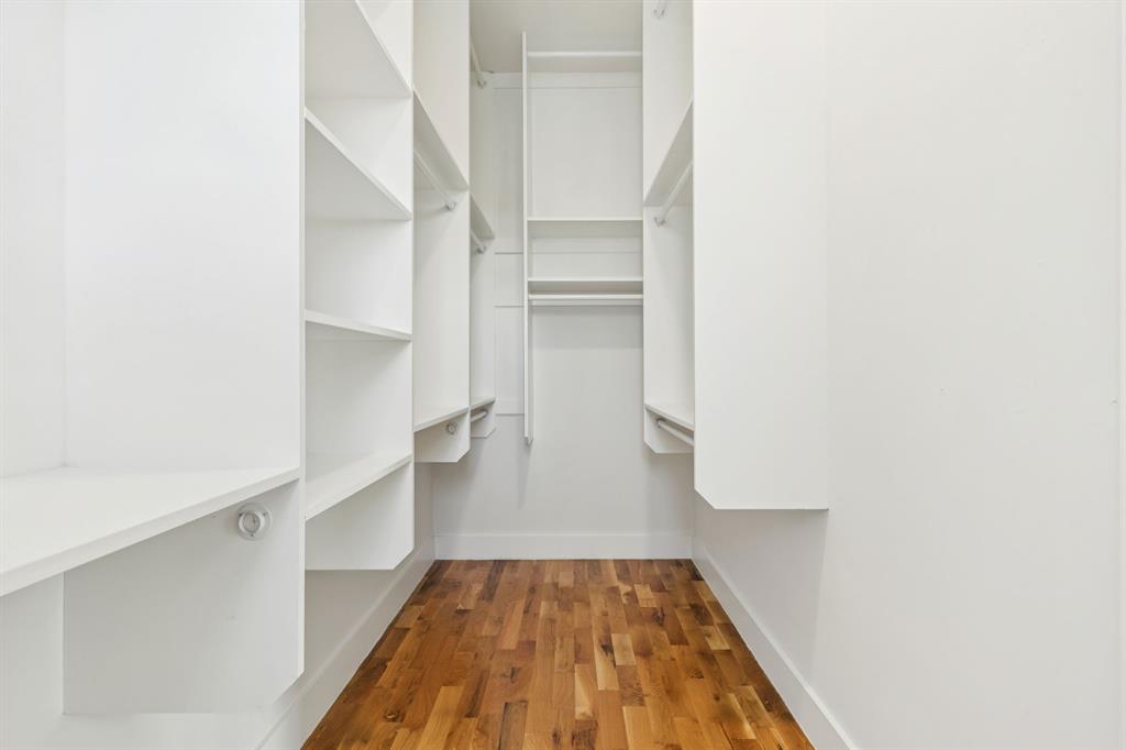 4119 Munger Avenue Dallas, TX 75204 - Photo 15 of 30 a view of walk in closet with empty racks