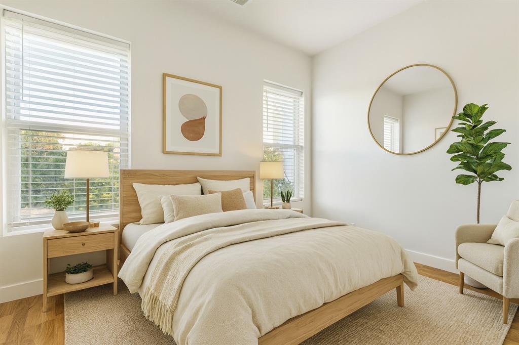 4119 Munger Avenue Dallas, TX 75204 - Photo 16 of 30 a bedroom with bed and a window