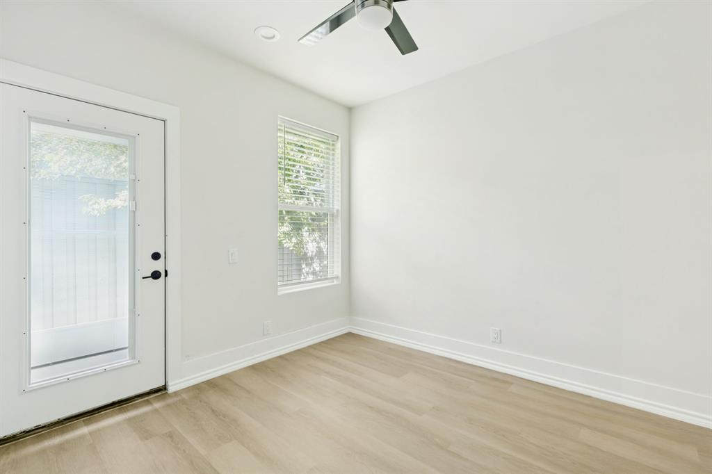 4119 Munger Avenue Dallas, TX 75204 - Photo 21 of 30 an empty room with a empty space and window