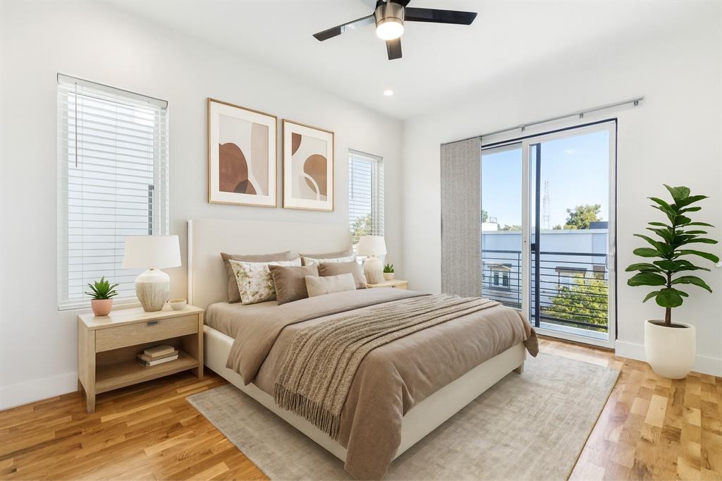4119 Munger Avenue Dallas, TX 75204 - Photo 10 of 30 a bedroom with a large bed and a window