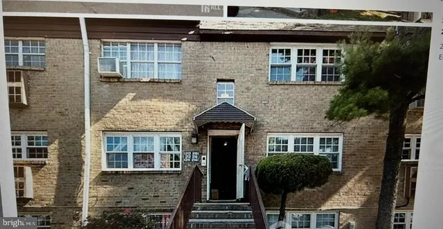 a front view of a house with glass windows