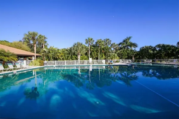 a view of lake with green space