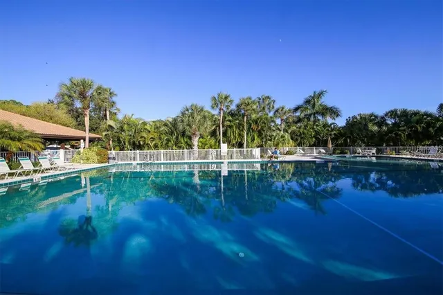 a view of lake with green space