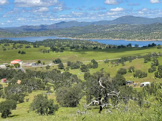 a view of a lake with a building in the background