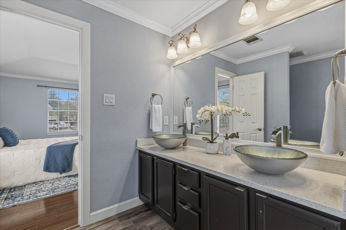 8103 Red Rock Cove Austin, TX 78749 - Photo 21 of 33 a kitchen with sink and view of living room