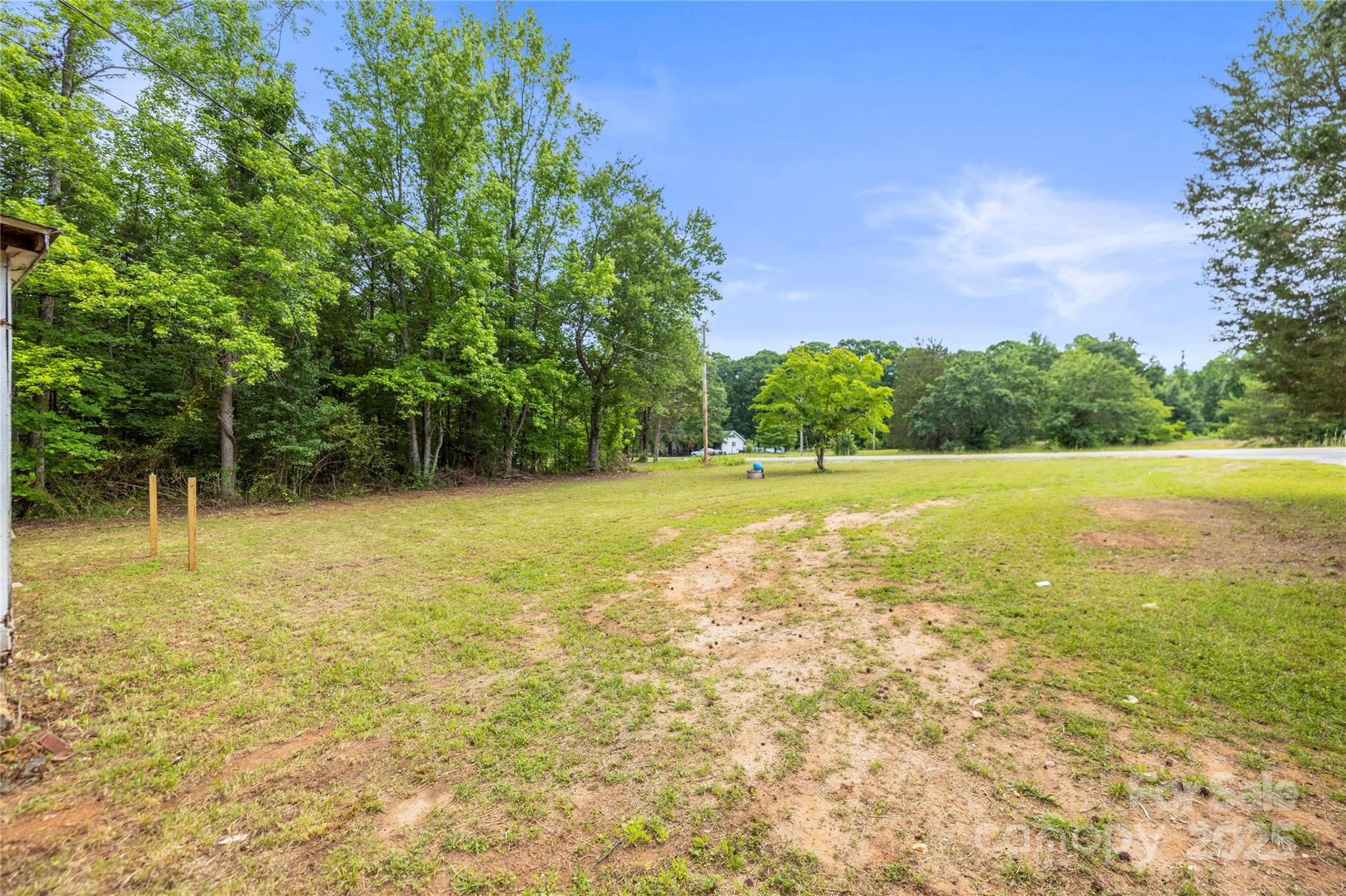 1317 Requa Road Cherryville, NC 28021 - Photo 3 of 14 a view of a field with an trees in the background