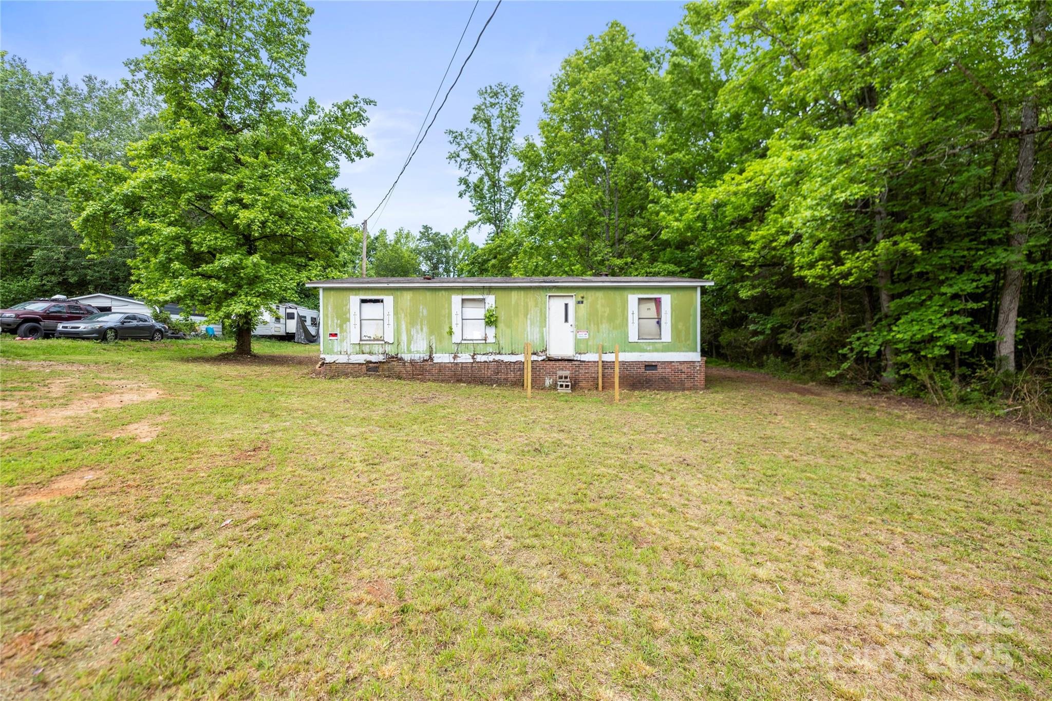 1317 Requa Road Cherryville, NC 28021 - Photo 9 of 14 a view of a house with pool and a yard