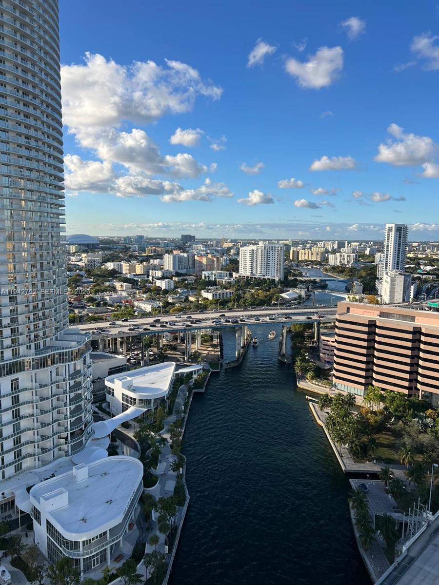185 Southwest 7th Street, Unit 2601 Miami, FL 33130 - Photo 2 of 17 a terrace with outdoor seating and city view