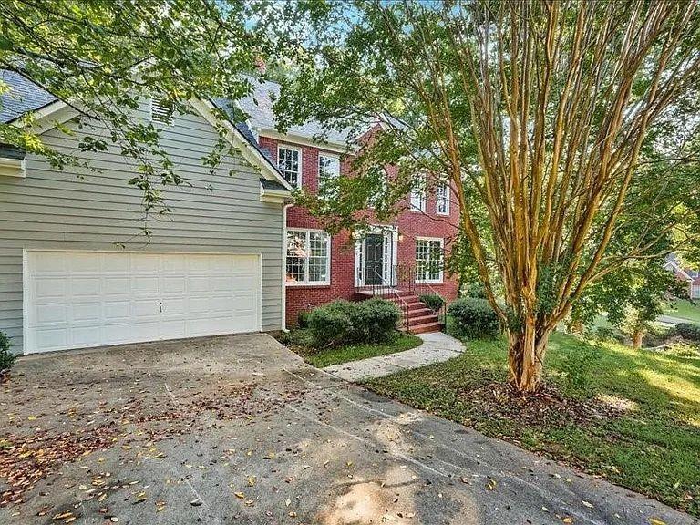 4382 Oakleaf Cove Decatur, GA 30034 - Photo 27 of 27 a front view of a house with garden