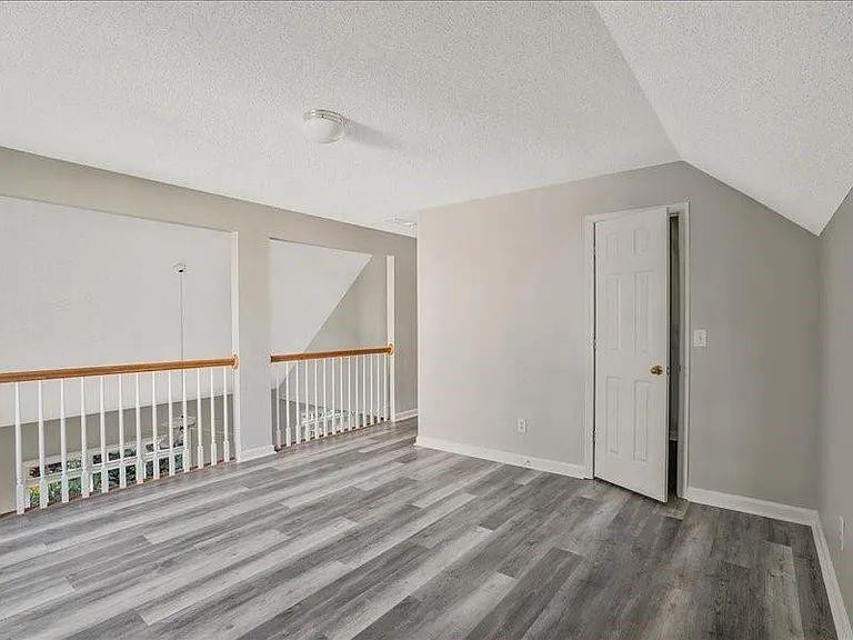 4382 Oakleaf Cove Decatur, GA 30034 - Photo 6 of 27 a view of a room with wooden floor