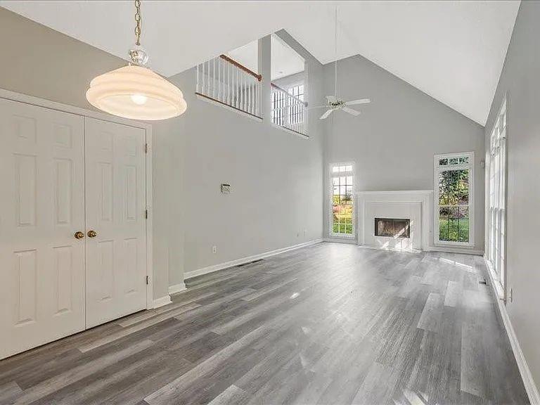 4382 Oakleaf Cove Decatur, GA 30034 - Photo 8 of 27 wooden floor in an empty room with a window