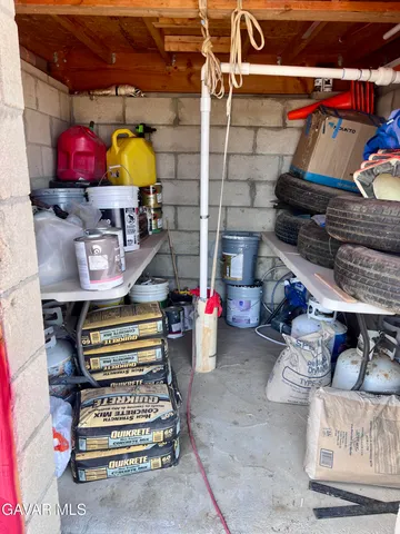 a view of a room with wooden walls