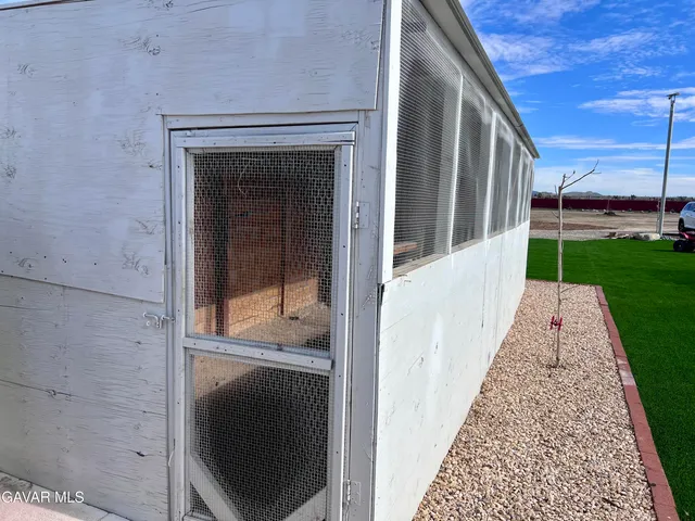 a view of a backyard with plants