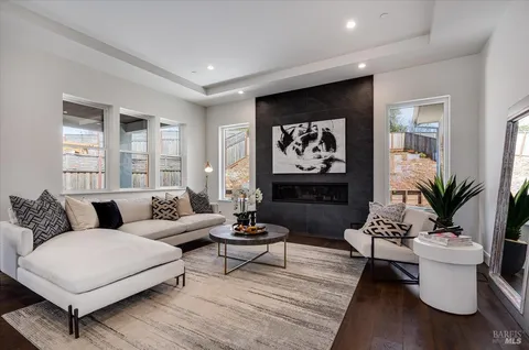 a kitchen with granite countertop a sink and stove