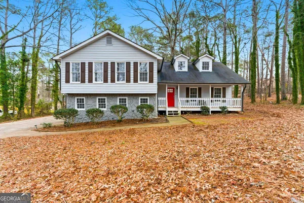 front view of a house with a yard