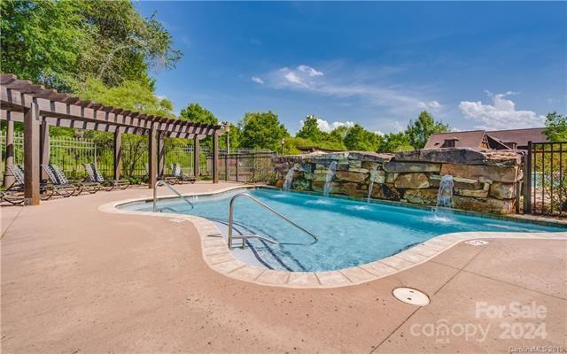 10601 Wildlife Road Charlotte, NC 28278 - Photo 8 of 31 a view of a park with slide