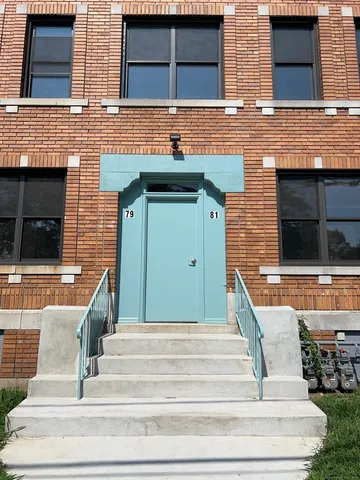 a front view of a house with entryway