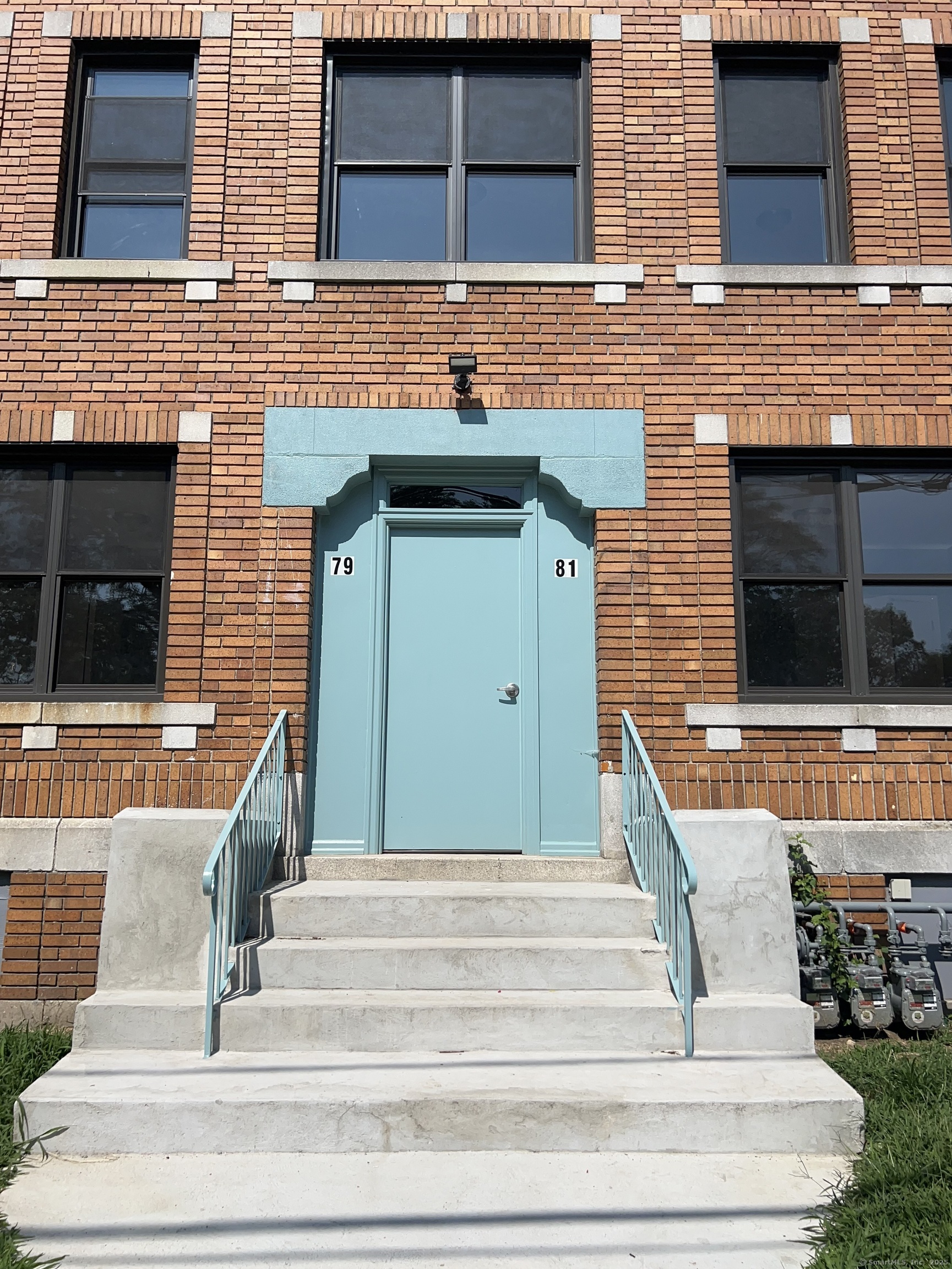79 Barbour Street, Unit S1 Hartford, CT 06120 - Photo 1 of 8 a front view of a house with entryway