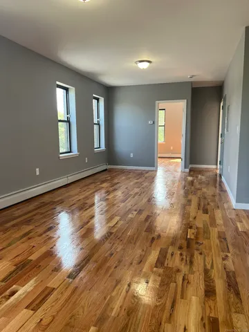 a view of an empty room and window