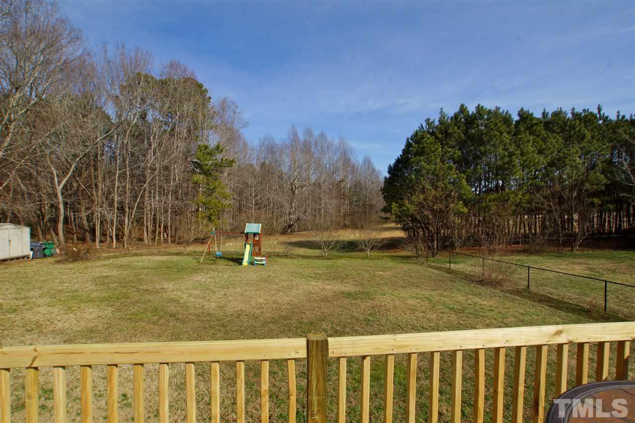 6813 Riley Hill Road Wendell, NC 27591 - Photo 22 of 25 a view of a yard with an outdoor space