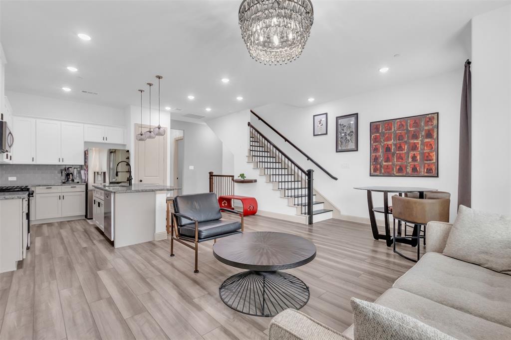 4153 Shavano Drive Frisco, TX 75034 - Photo 18 of 35 a living room with furniture and kitchen view