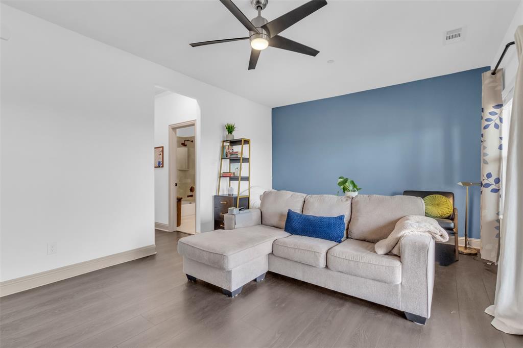 4153 Shavano Drive Frisco, TX 75034 - Photo 26 of 35 a living room with furniture and a ceiling fan