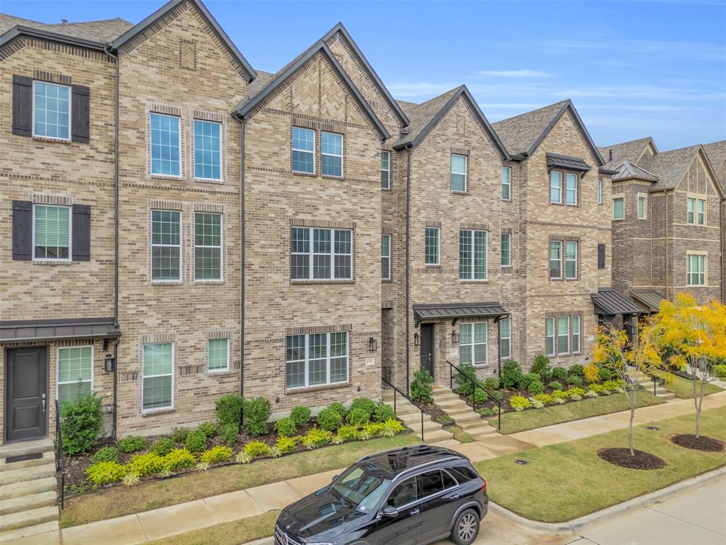 4153 Shavano Drive Frisco, TX 75034 - Photo 35 of 35 a front view of a house with a yard