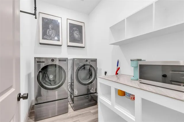 a utility room with dryer and washer