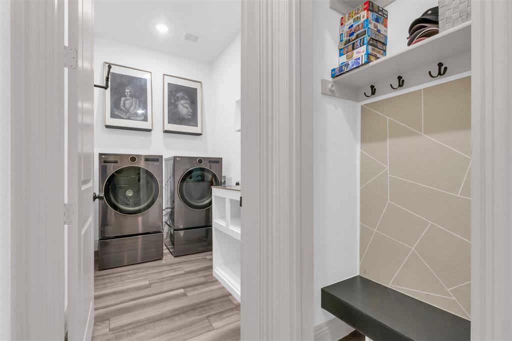 4153 Shavano Drive Frisco, TX 75034 - Photo 10 of 35 a view of storage and utility room with washer and dryer