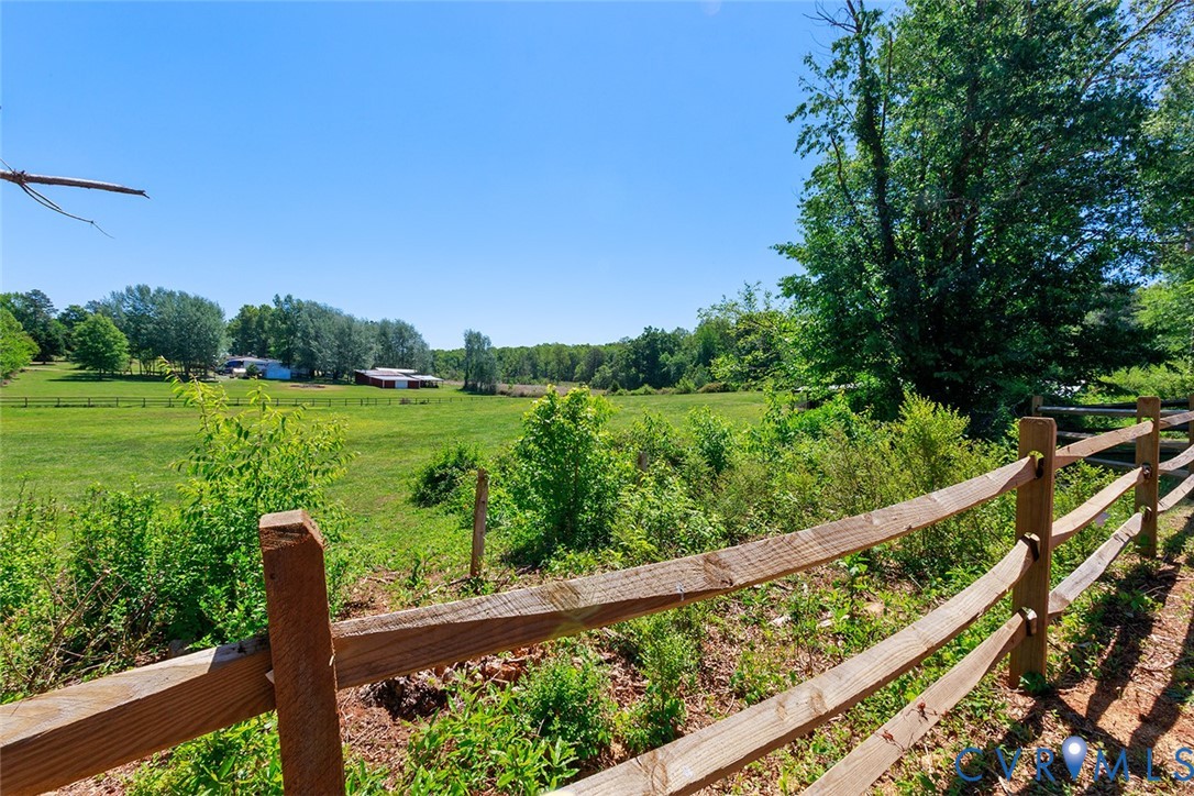 9903 Boze Road Ford, VA 23850 - Photo 44 of 45 a view of a wooden deck with a yard