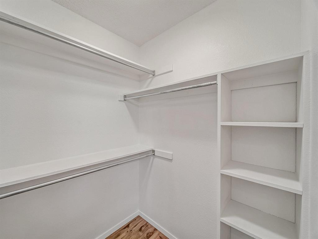3105 Regency Carrollton, TX 75007 - Photo 13 of 18 a view of an empty walk in closet