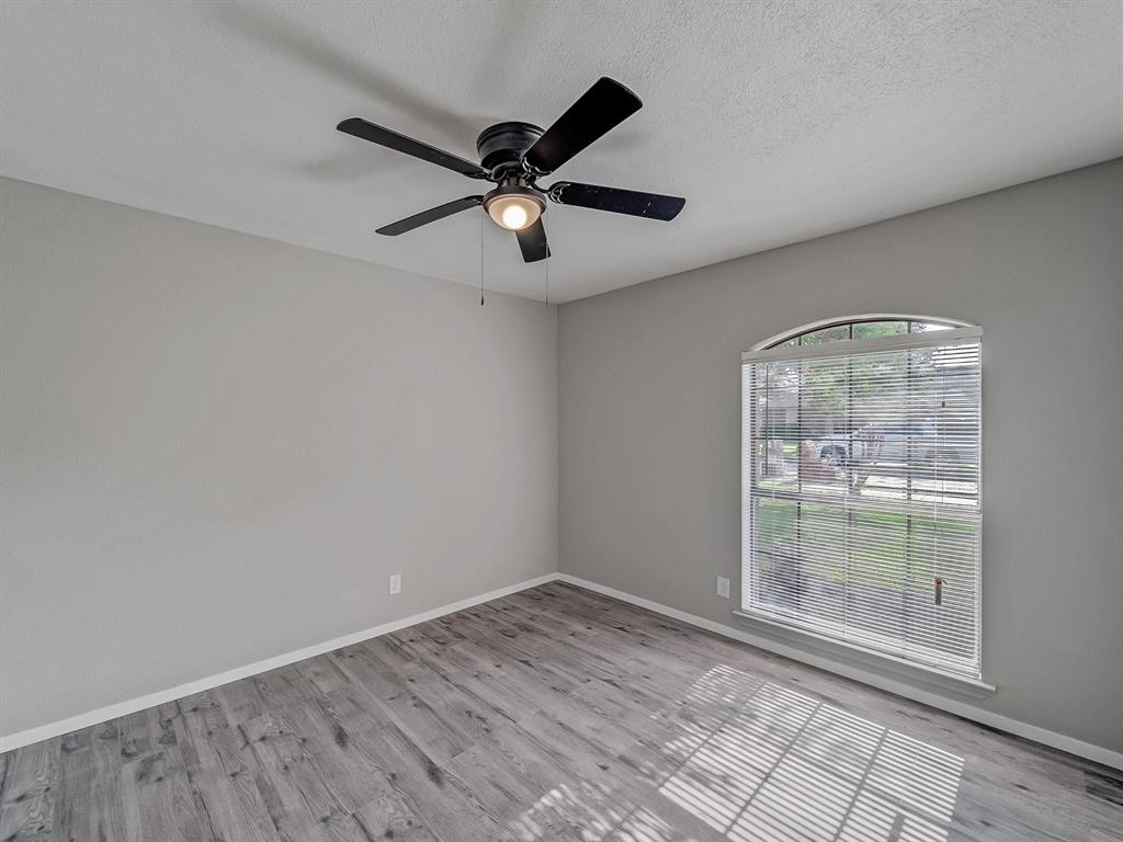 3105 Regency Carrollton, TX 75007 - Photo 14 of 18 wooden floor in an empty room