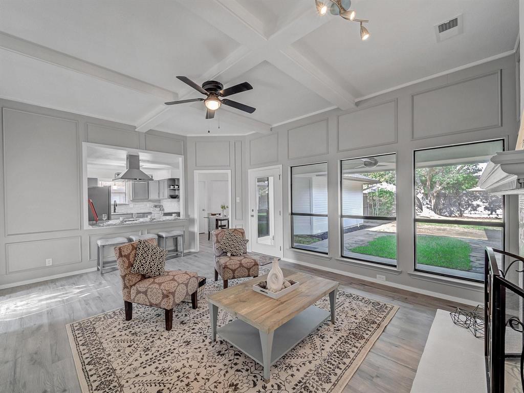 3105 Regency Carrollton, TX 75007 - Photo 3 of 18 a living room with furniture and a rug