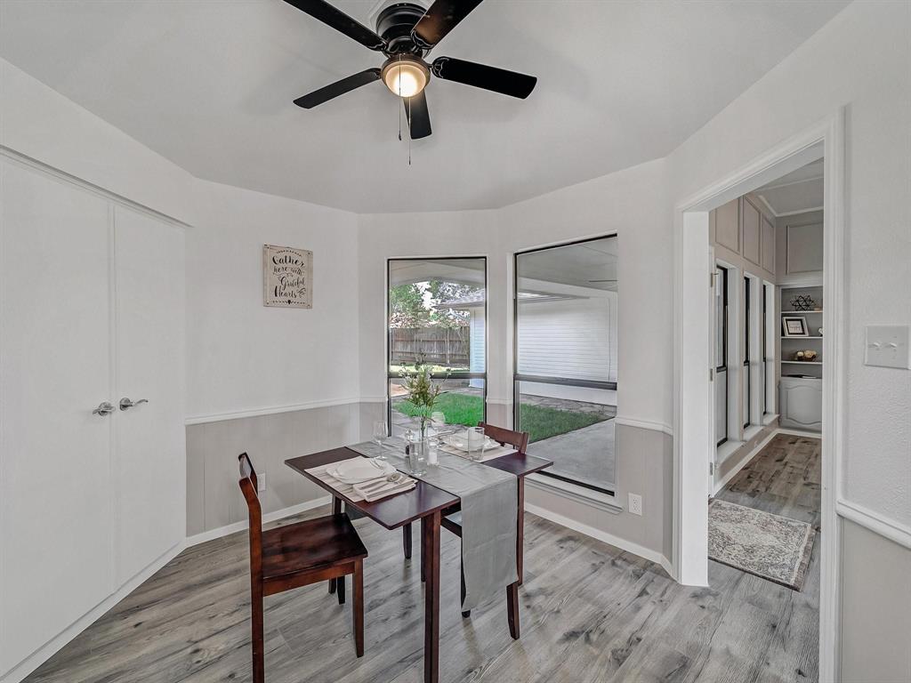 3105 Regency Carrollton, TX 75007 - Photo 8 of 18 a workspace with furniture window and wooden floor