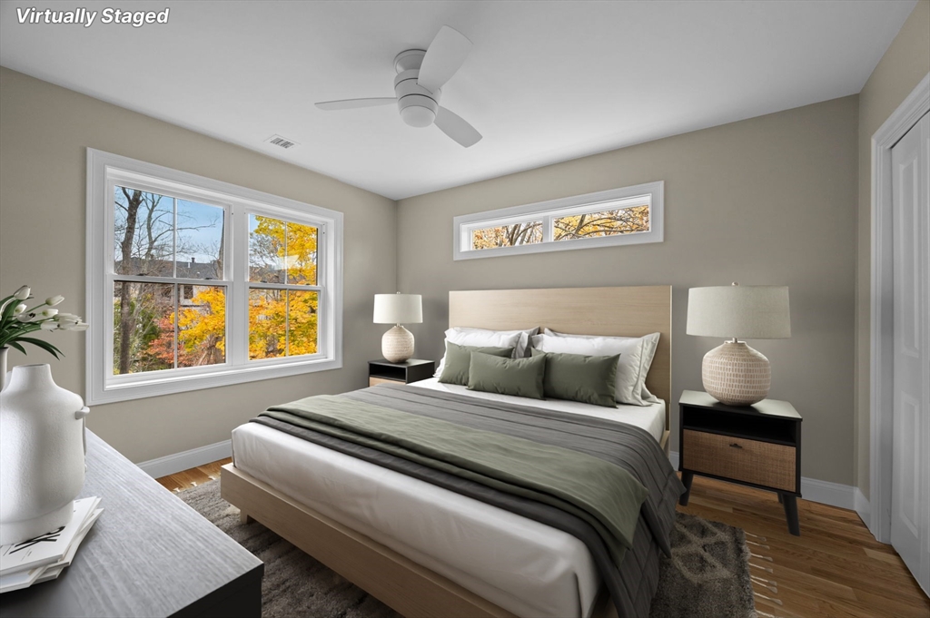 9 Acton Road, Unit 10 Chelmsford, MA 01824 - Photo 5 of 15 a bedroom with bed and window