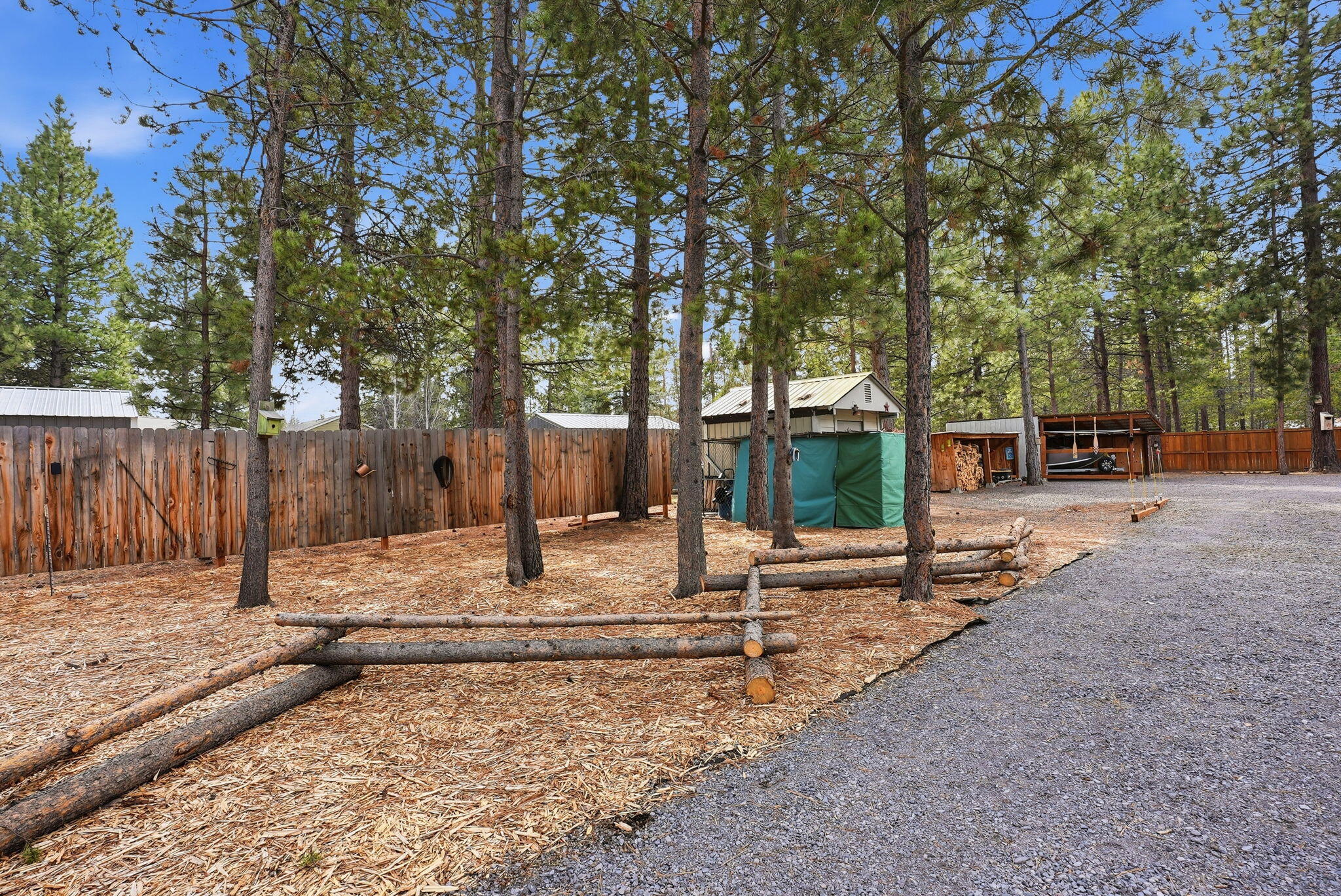 51432 Jory Road La Pine, OR 97739 - Photo 31 of 51 a backyard of house with trees and barbeque oven