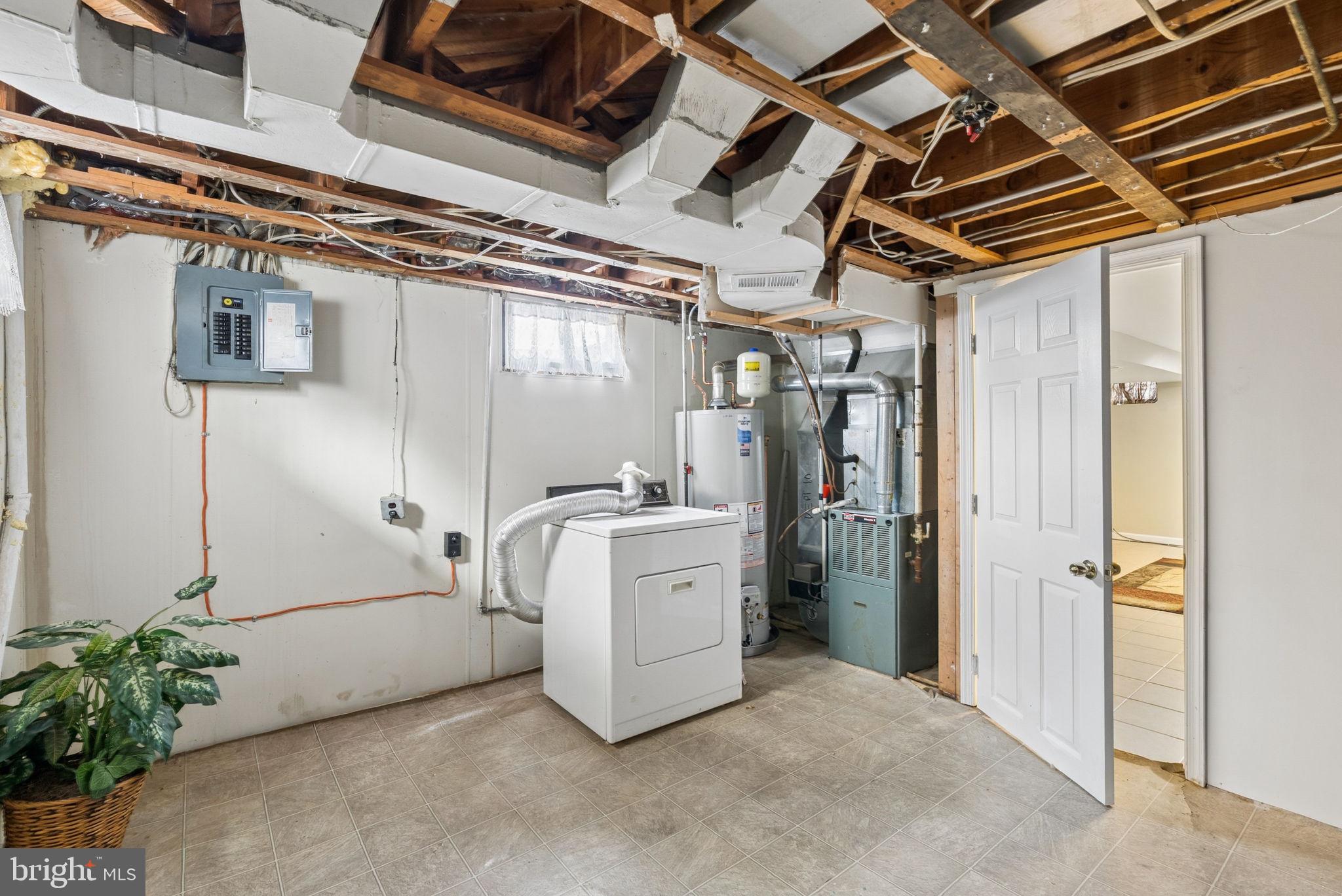 2169 Firethorn Road Baltimore, MD 21220 - Photo 33 of 53 Spacious basement with laundry setup.