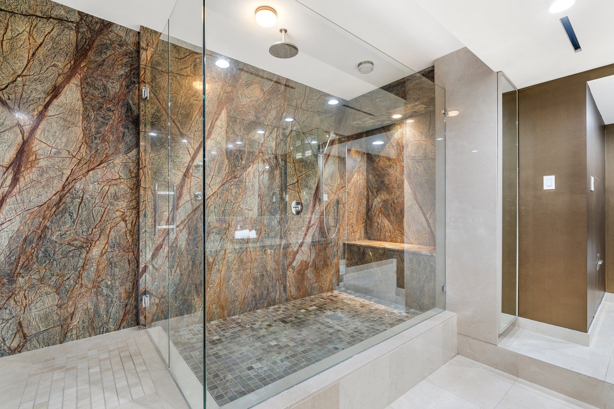 2001 Holcombe Boulevard, Unit PH4 Houston, TX 77030 - Photo 9 of 46 a bathroom with a granite countertop sink and shower