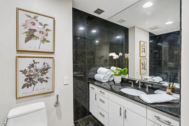 a view of cabinets and window