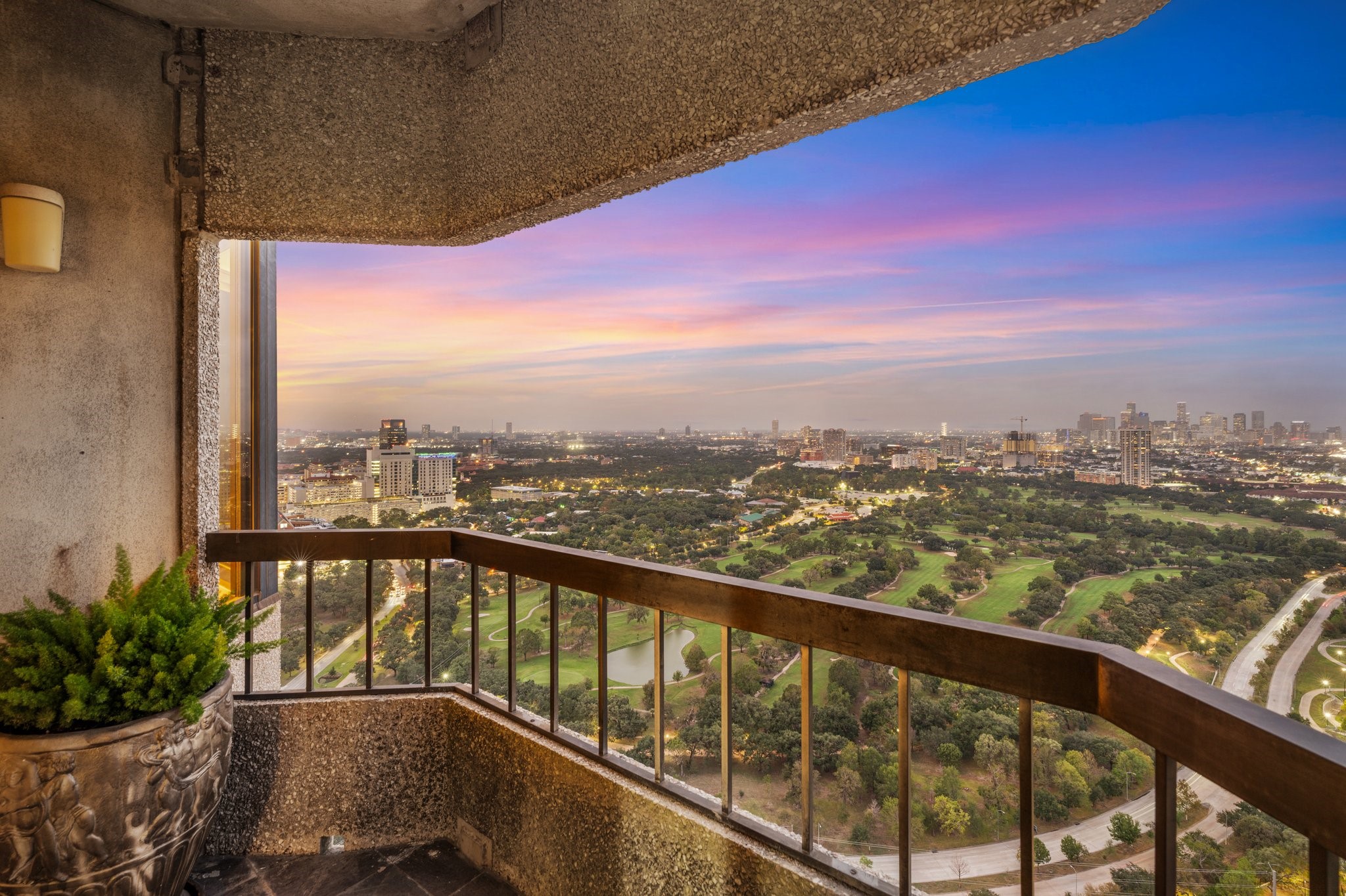 2001 Holcombe Boulevard, Unit PH4 Houston, TX 77030 - Photo 13 of 46 a view of a city from a balcony