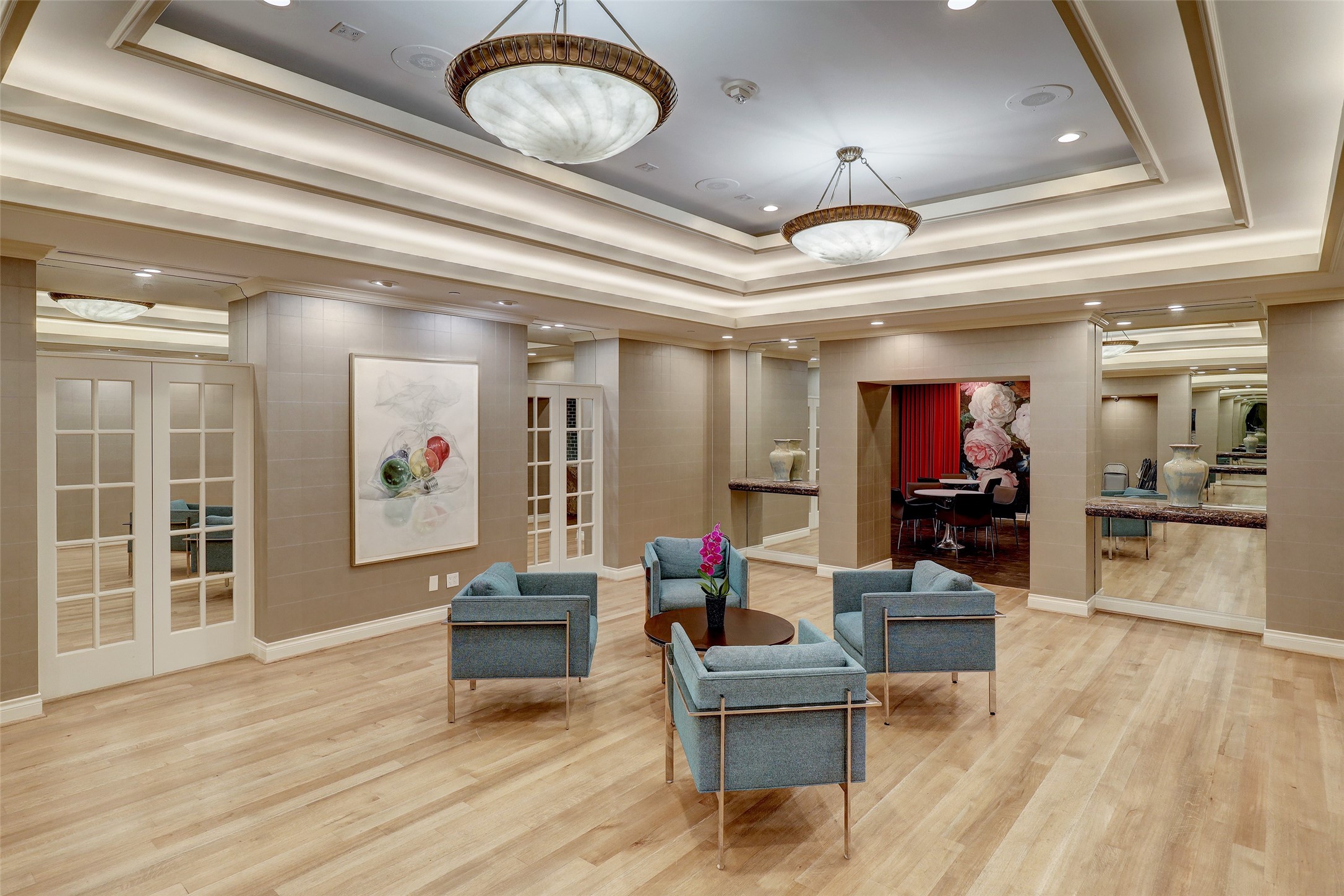 2001 Holcombe Boulevard, Unit PH4 Houston, TX 77030 - Photo 23 of 46 a living room with furniture and a chandelier