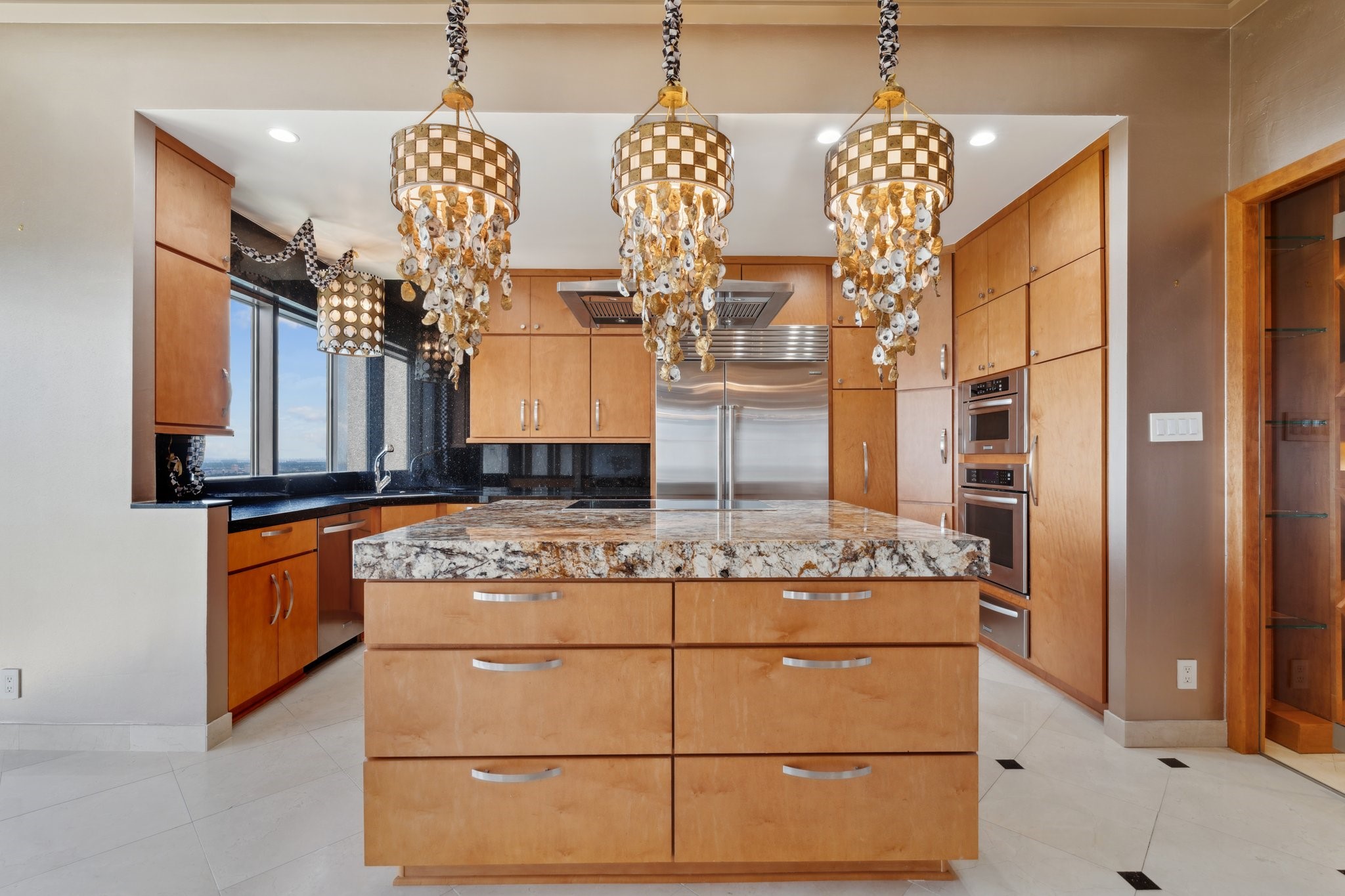 2001 Holcombe Boulevard, Unit PH4 Houston, TX 77030 - Photo 3 of 46 a kitchen with stainless steel appliances granite countertop a stove a sink and a refrigerator