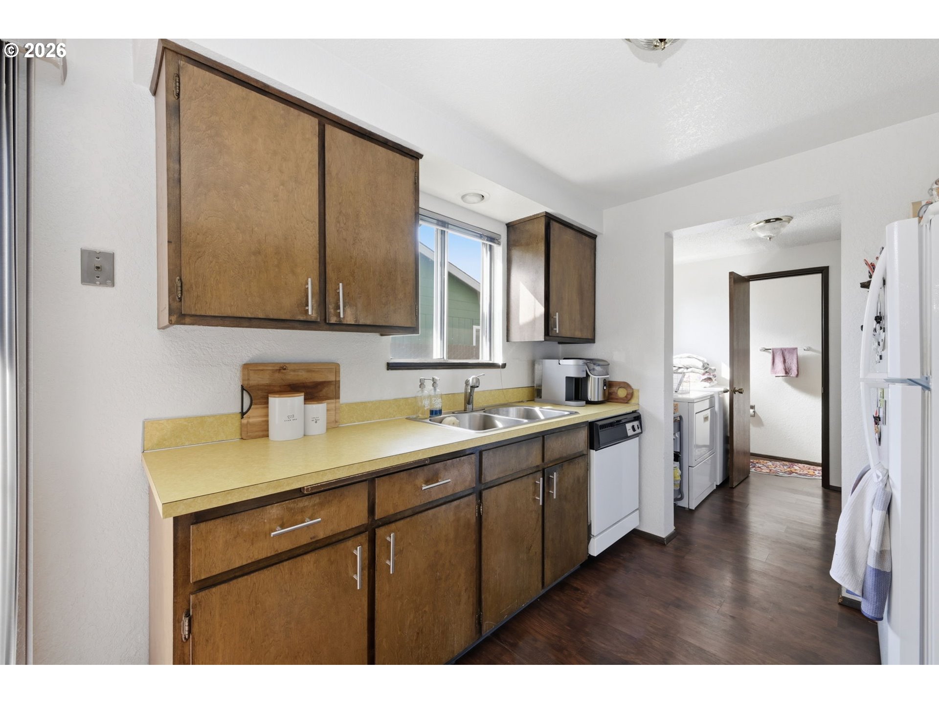 2018 Debra Drive Springfield, OR 97477 - Photo 12 of 42 a kitchen with a sink cabinets and wooden floor